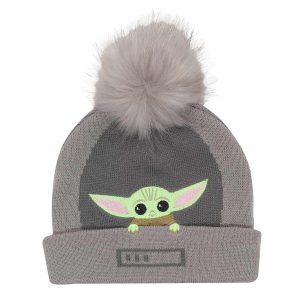 Stay cozy and stylish with our Star Wars The Mandalorian - Grogu In The Crib Beanie. Perfect for fans of the adorable Grogu, also known as "The Child," this beanie features a charming design that captures the heart of the beloved character from The Mandalorian series.